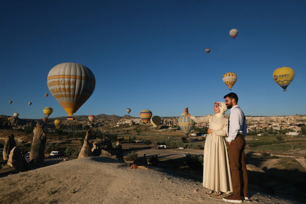 A beautiful couple doing selfie,Wedding in Cappadocia, Goreme with a young married couple